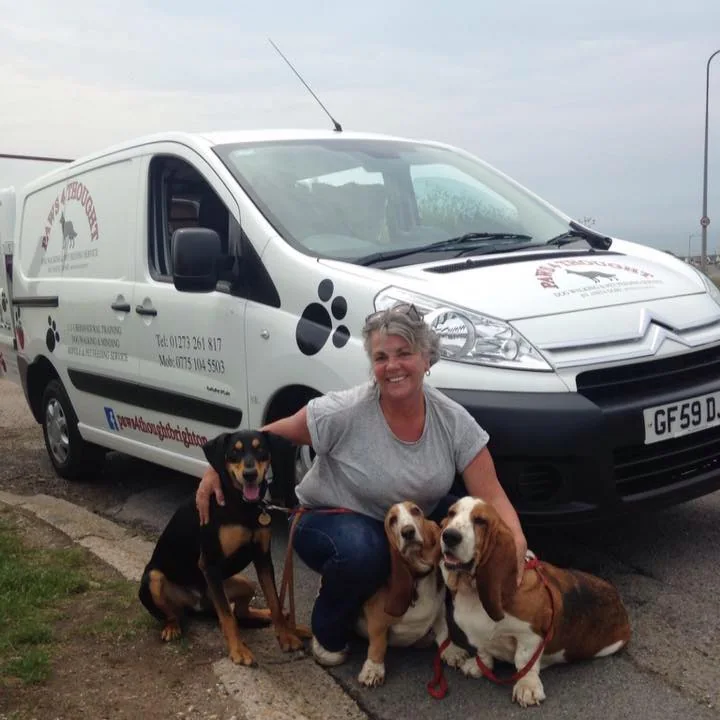 Anita Doré, founder of Paws 4 Thought Brighton, with her dogs and the paws4thoughtbrighton van